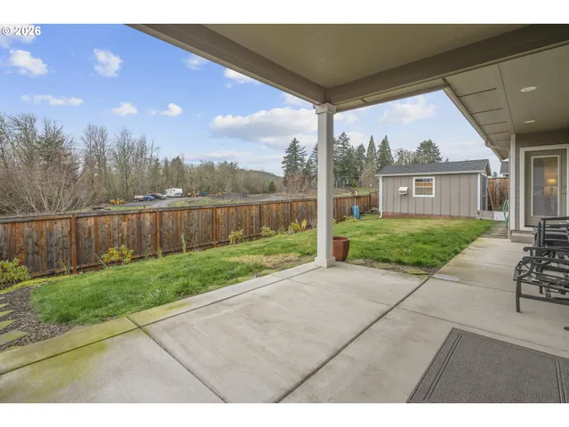 a view of backyard with green space