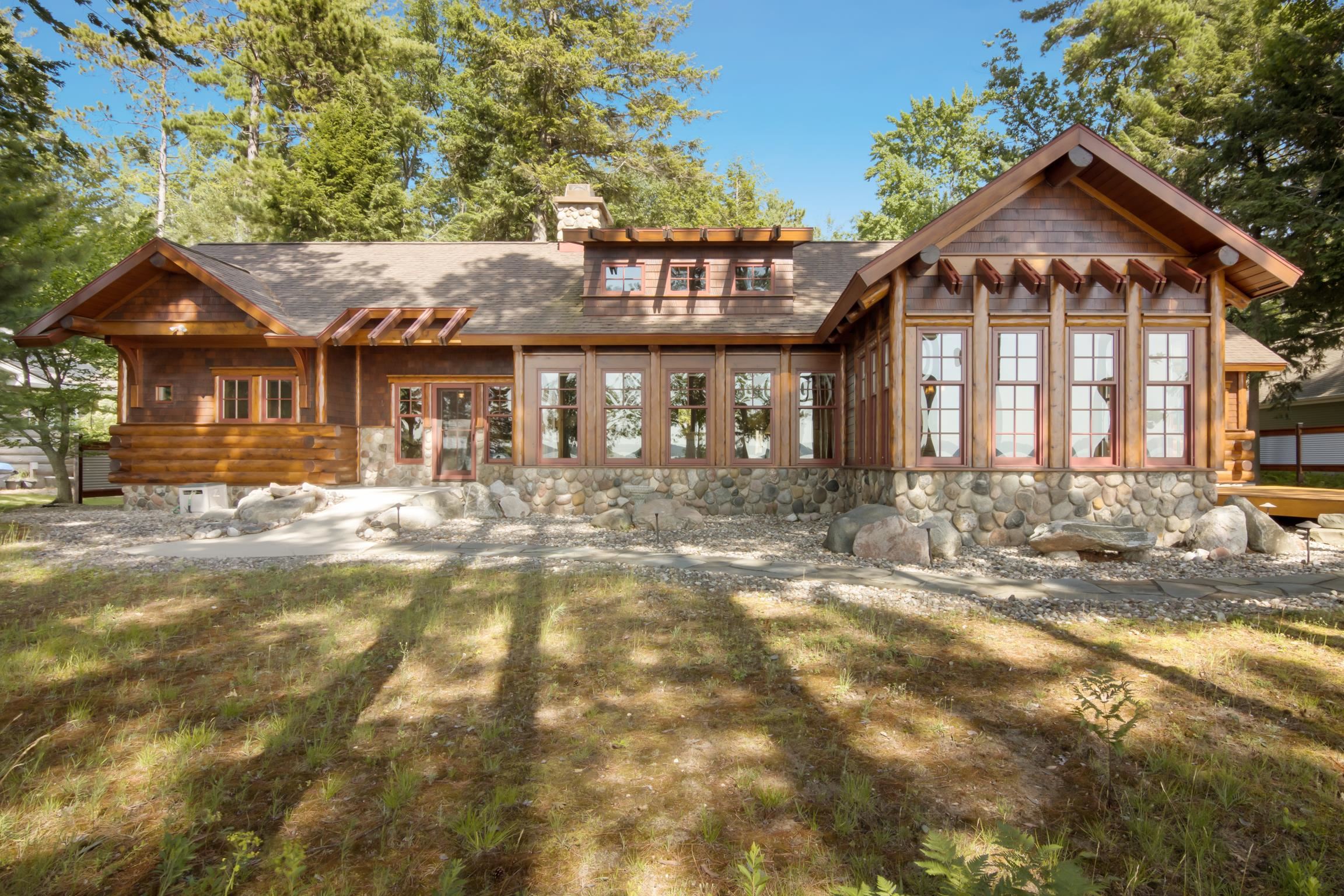 8739 Skegemog Point Road Williamsburg, MI 49690 - Photo 2 of 63