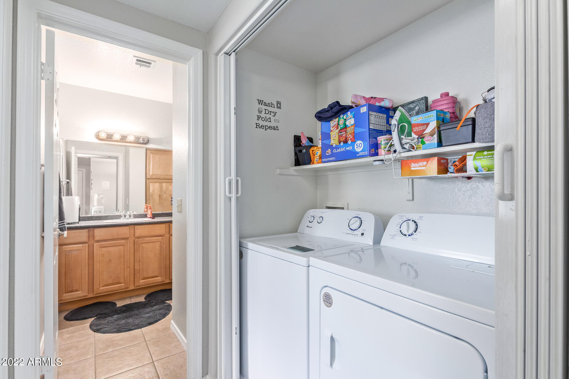 1825 West Ray Road, Unit 1070 Chandler, AZ 85224 - Photo 14 of 23 Laundry Closet