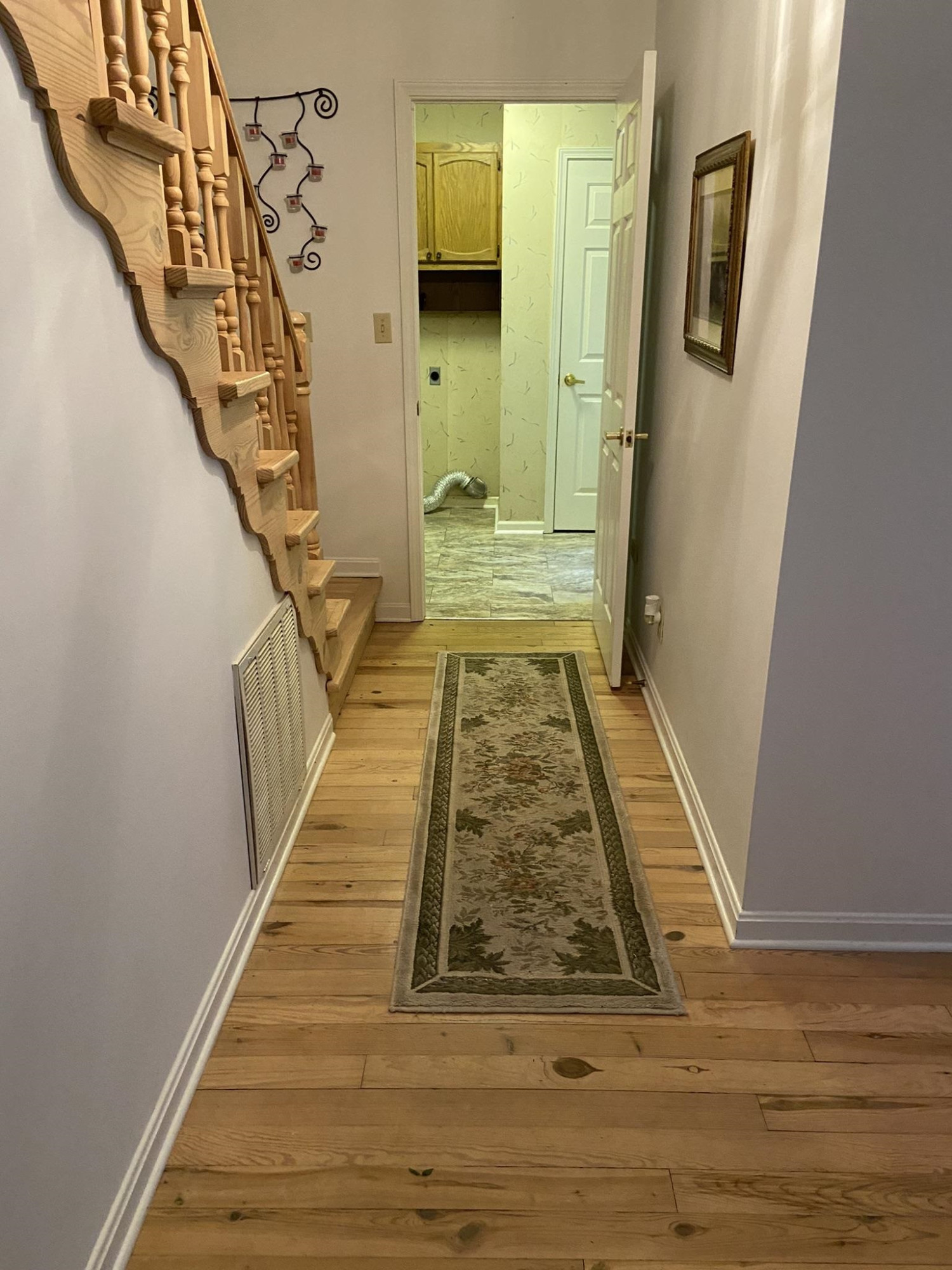 70 Mockingbird Road Henderson, TN 38340 - Photo 16 of 47 a view of a hallway with wooden floor and staircase