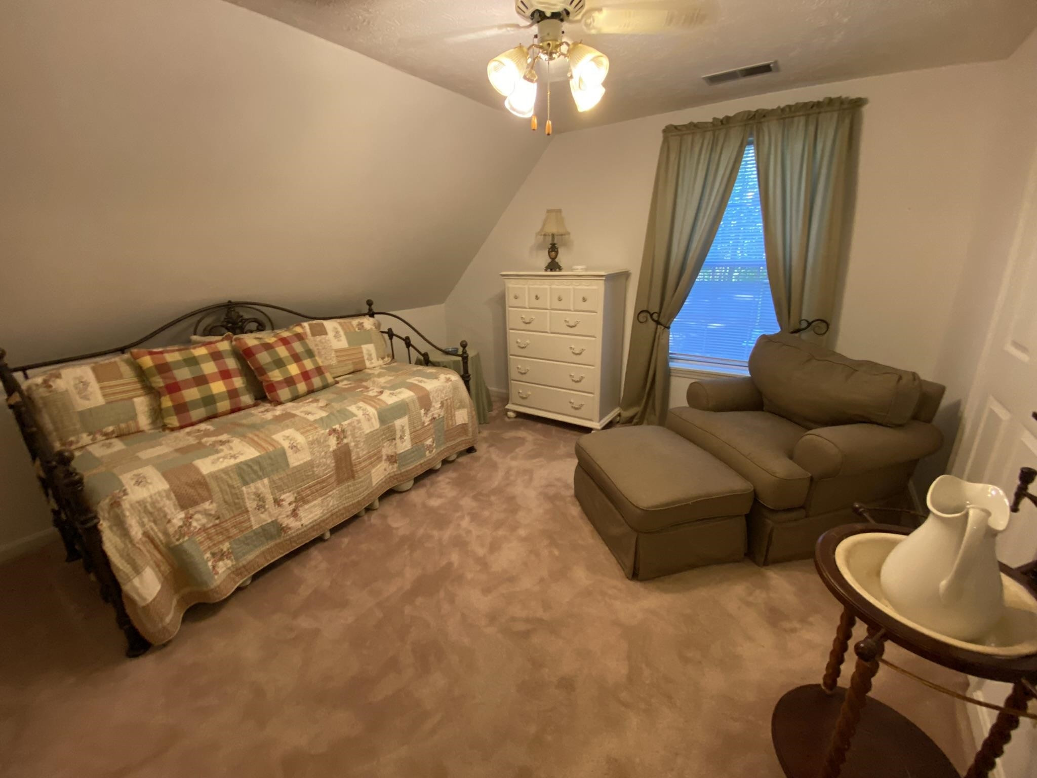 70 Mockingbird Road Henderson, TN 38340 - Photo 19 of 47 a bedroom with furniture and a large window