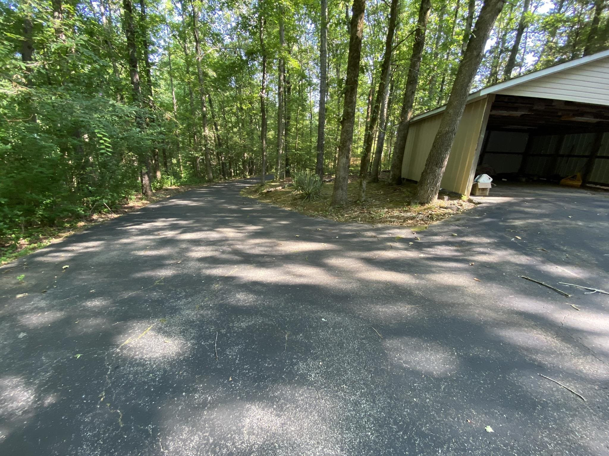 70 Mockingbird Road Henderson, TN 38340 - Photo 42 of 47 a view of a house with backyard