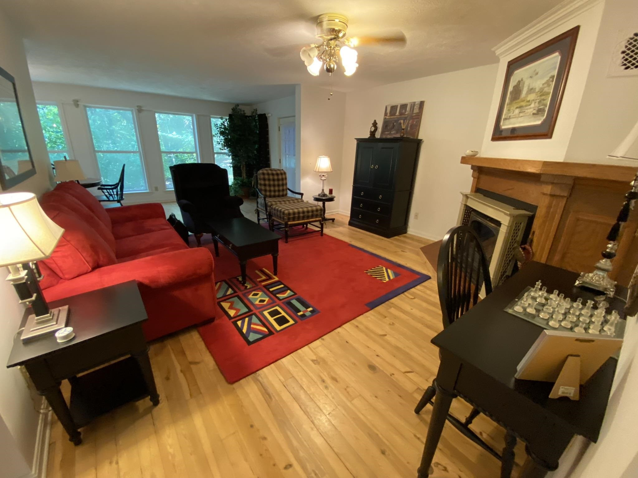 70 Mockingbird Road Henderson, TN 38340 - Photo 5 of 47 a living room with furniture fireplace and a flat screen tv