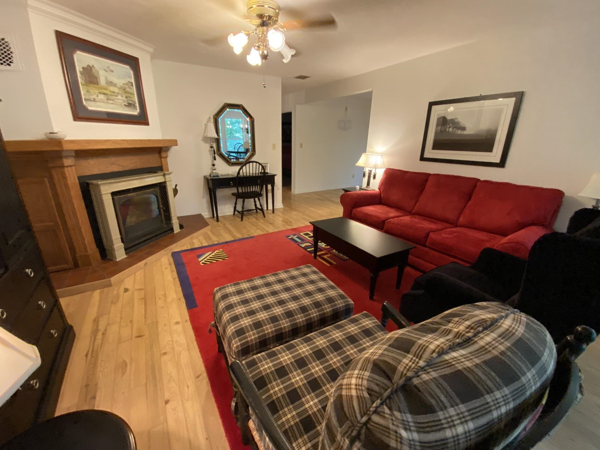 70 Mockingbird Road Henderson, TN 38340 - Photo 6 of 47 a bedroom with furniture and a fireplace