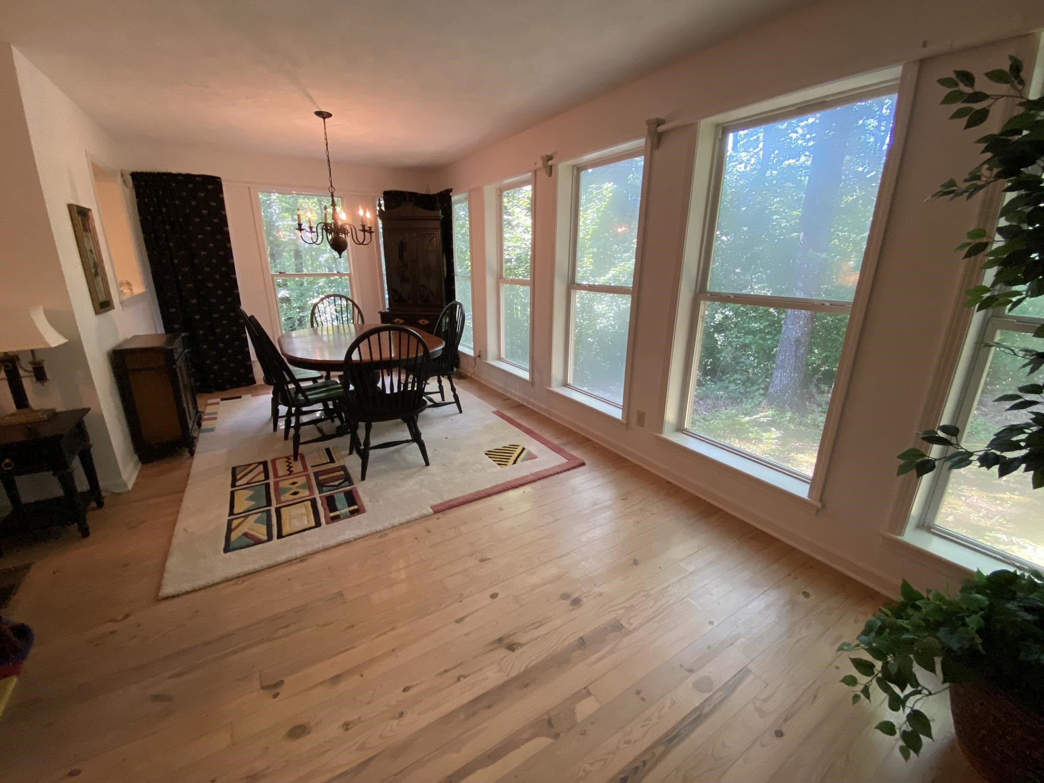 70 Mockingbird Road Henderson, TN 38340 - Photo 8 of 47 a view of a dining room with furniture window and wooden floor