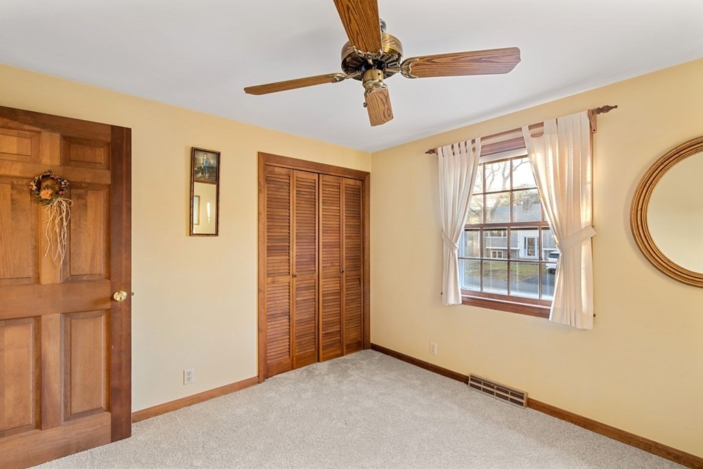 60 Beaten Road Dennis, MA 02639 - Photo 16 of 26 a view of an empty room with a window