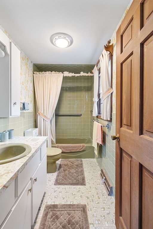 60 Beaten Road Dennis, MA 02639 - Photo 19 of 26 a bathroom with a granite countertop sink a toilet and shower