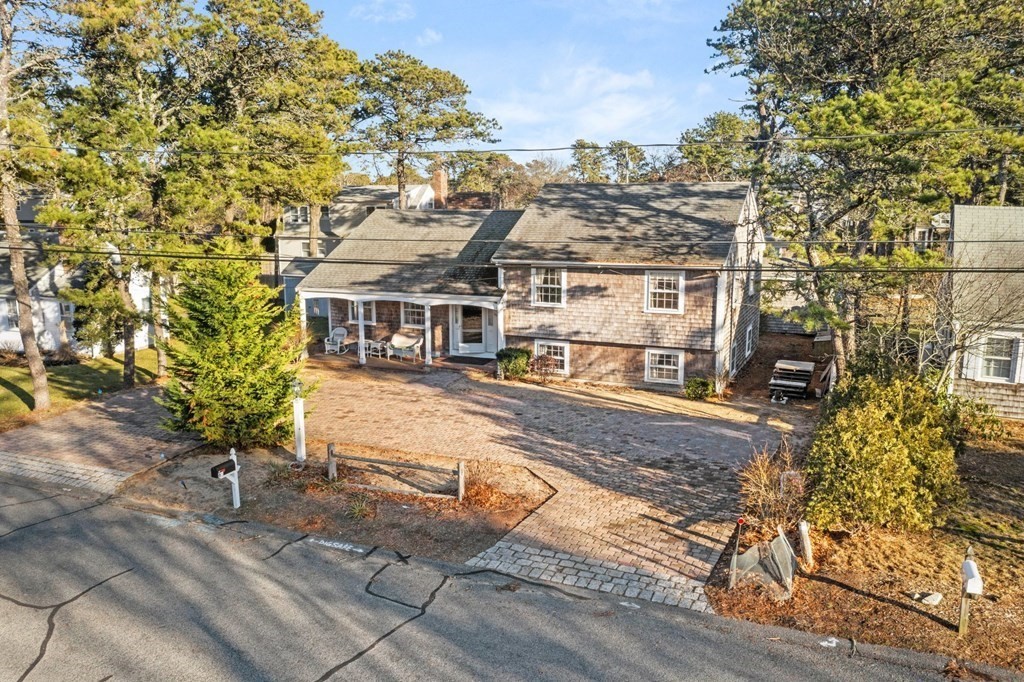60 Beaten Road Dennis, MA 02639 - Photo 20 of 26 front view of a house with a yard