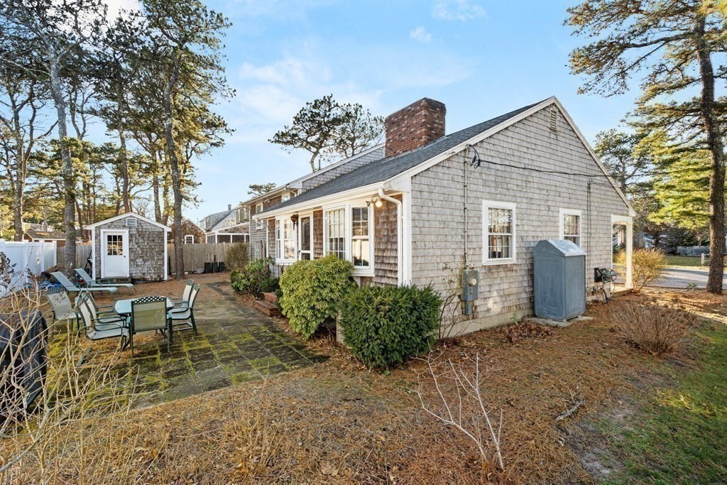 60 Beaten Road Dennis, MA 02639 - Photo 25 of 26 a view of a house with a patio