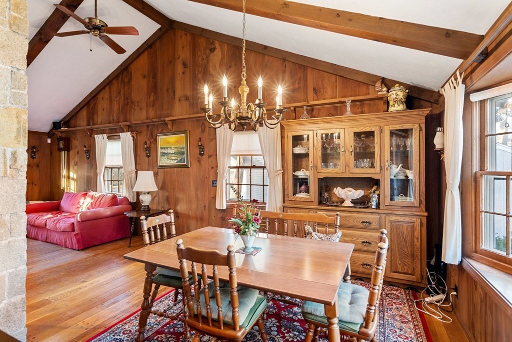 60 Beaten Road Dennis, MA 02639 - Photo 6 of 26 a view of a dining room with furniture window and wooden floor
