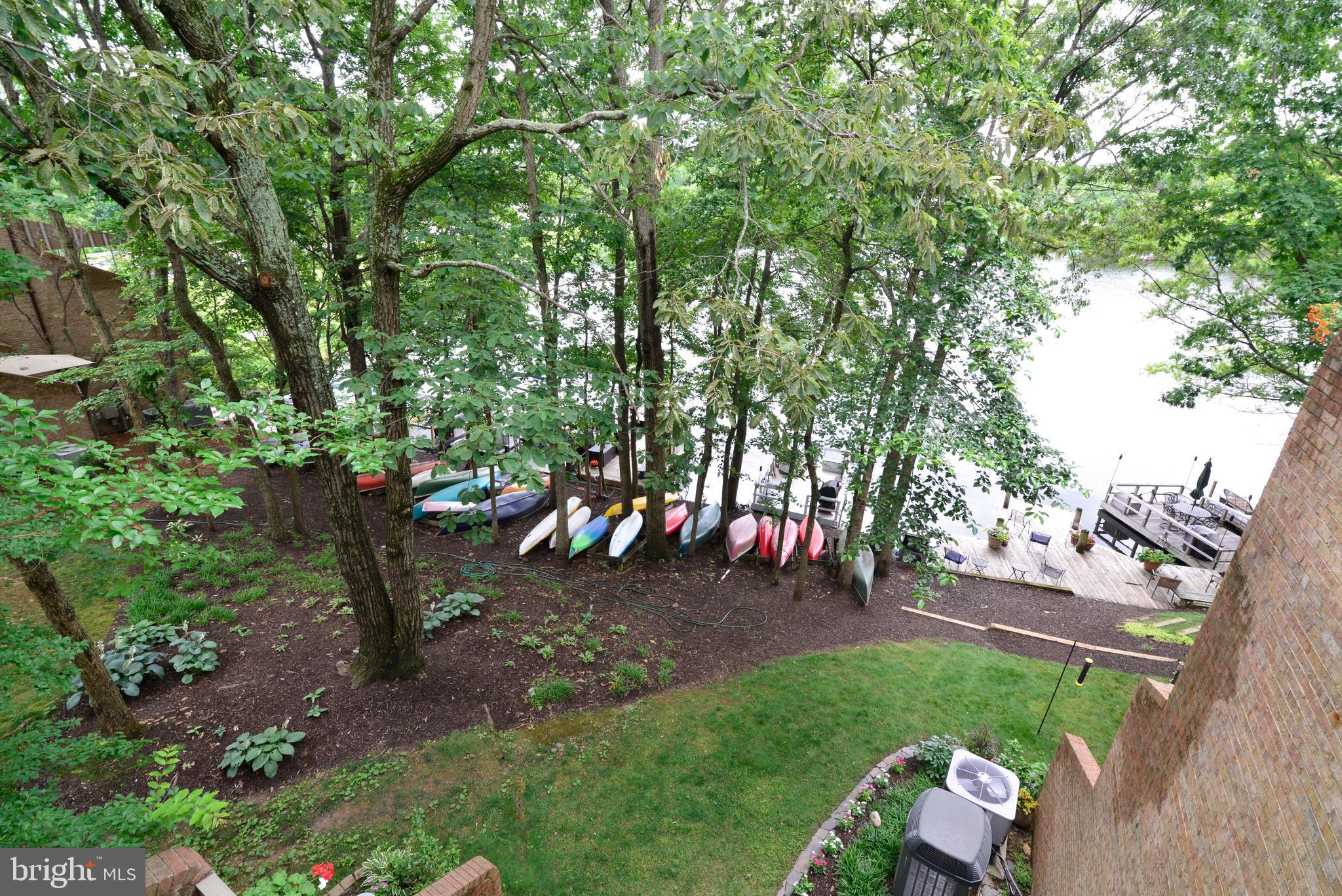 11128 Harbor Court Reston, VA 20191 - Photo 7 of 44 The balcony offers great views of the lake & trees