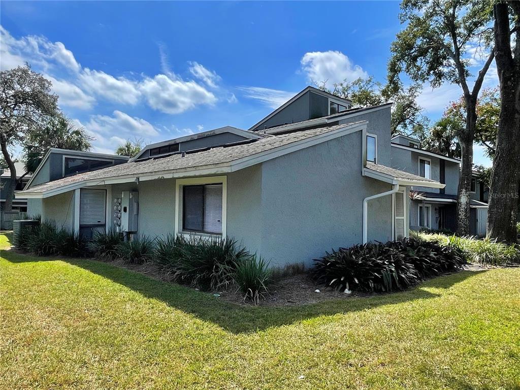 702 St Matthew Circle Altamonte Springs, FL 32714 - Photo 23 of 27 a view of a house with a yard