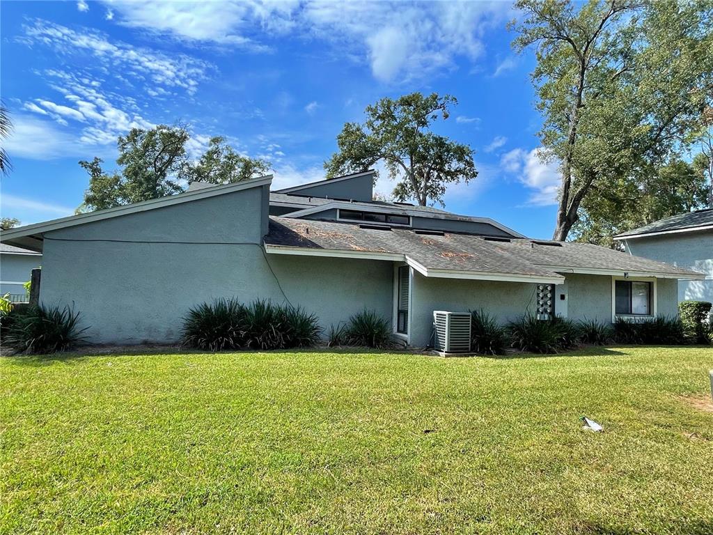 702 St Matthew Circle Altamonte Springs, FL 32714 - Photo 24 of 27 a front view of house with yard and green space
