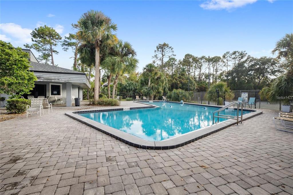 702 St Matthew Circle Altamonte Springs, FL 32714 - Photo 26 of 27 a view of a swimming pool with a patio