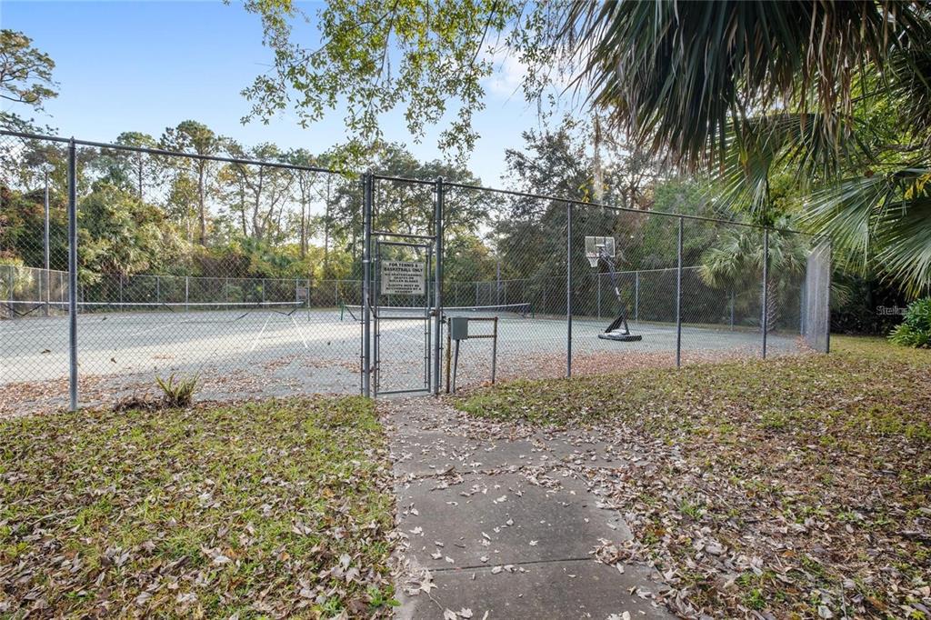 702 St Matthew Circle Altamonte Springs, FL 32714 - Photo 27 of 27 a backyard of a house with lots of green space