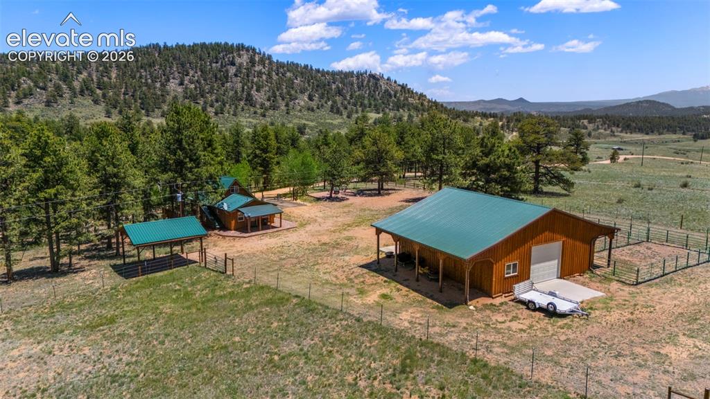 546 Pulver Road Lake George, CO 80827 - Photo 41 of 45 a view of a house with a yard