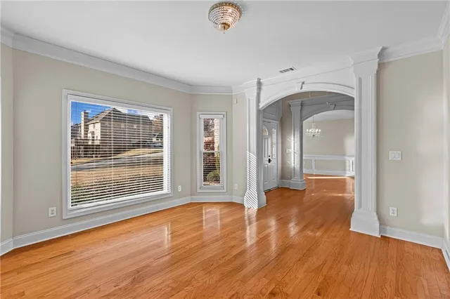 a view of livingroom with furniture wooden floor and window