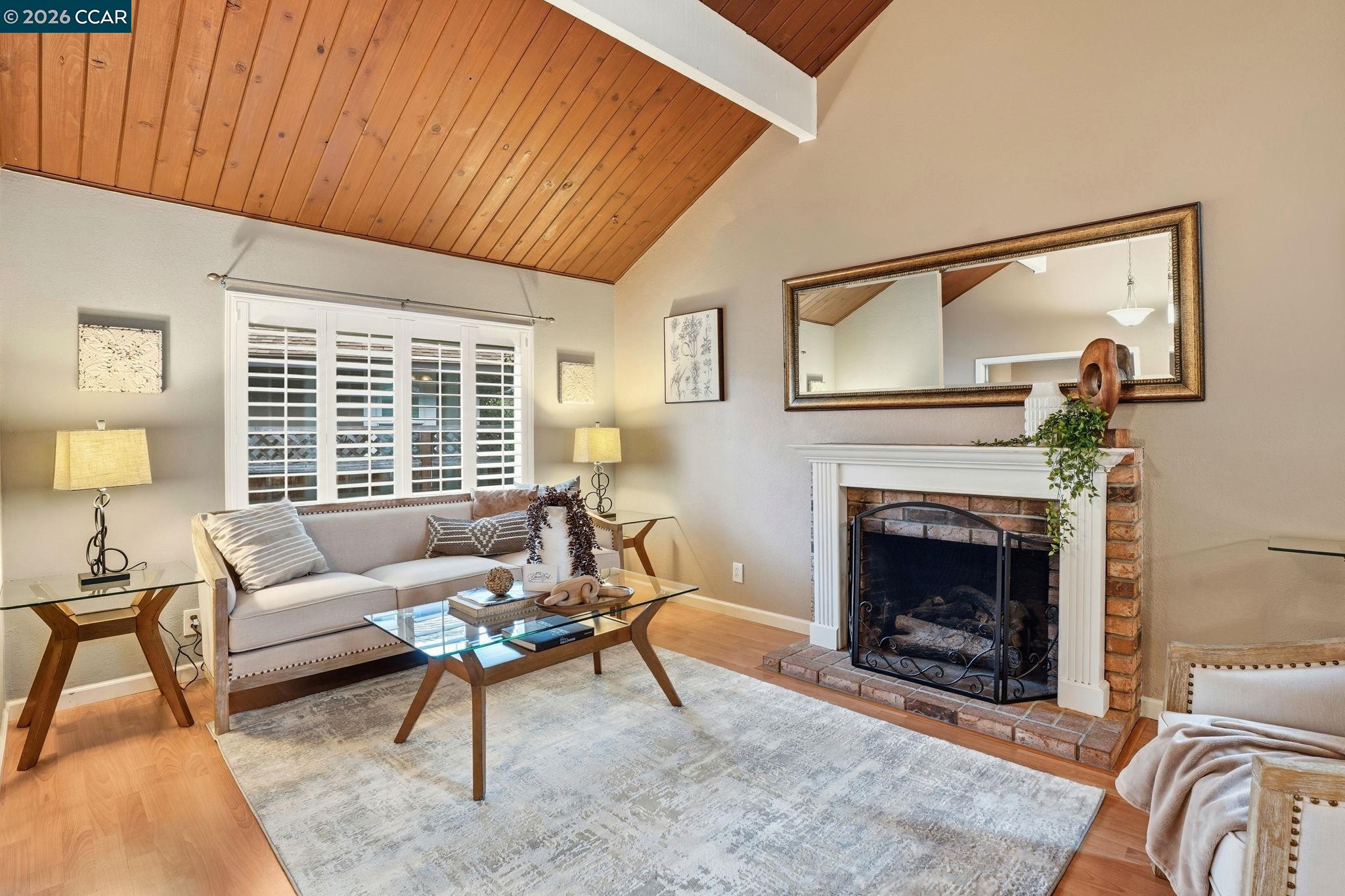5454 Anselmo Court Concord, CA 94521 - Photo 7 of 44 a living room with furniture and a fireplace