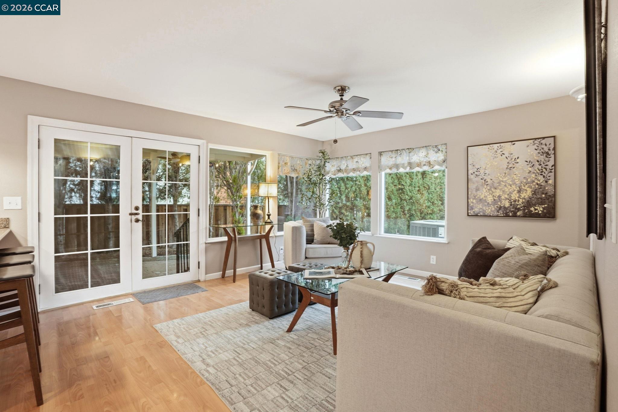 5454 Anselmo Court Concord, CA 94521 - Photo 8 of 44 a living room with furniture and large windows