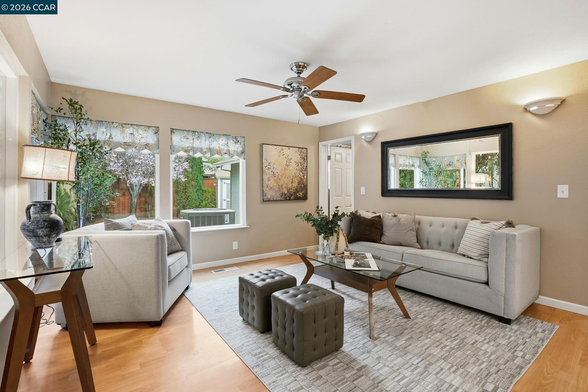 5454 Anselmo Court Concord, CA 94521 - Photo 9 of 44 a living room with furniture and a large window