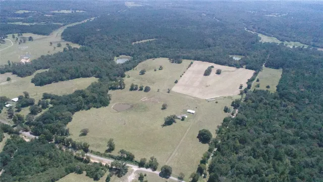 a picture of a bathroom with a tub and shower
