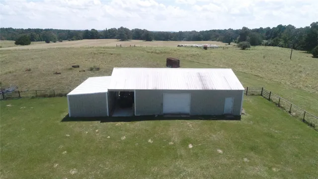 an aerial view of a house with garden
