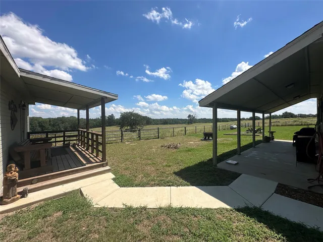 a view of a house with a garden