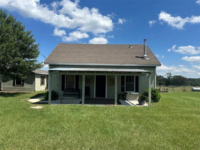 a view of an ocean beach and city