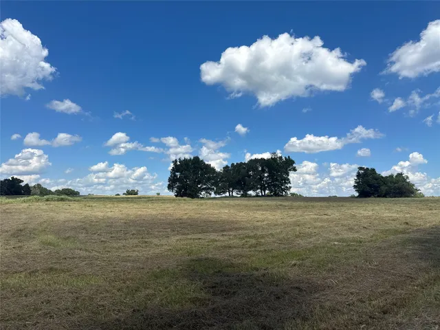 a view of swimming pool with lounge chair