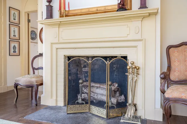 a dining room with a table and chairs