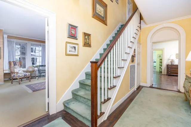 a view of a livingroom with furniture and windows
