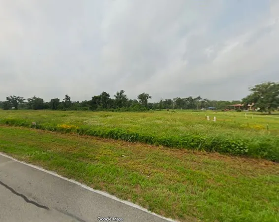 a view of a golf course with a lake
