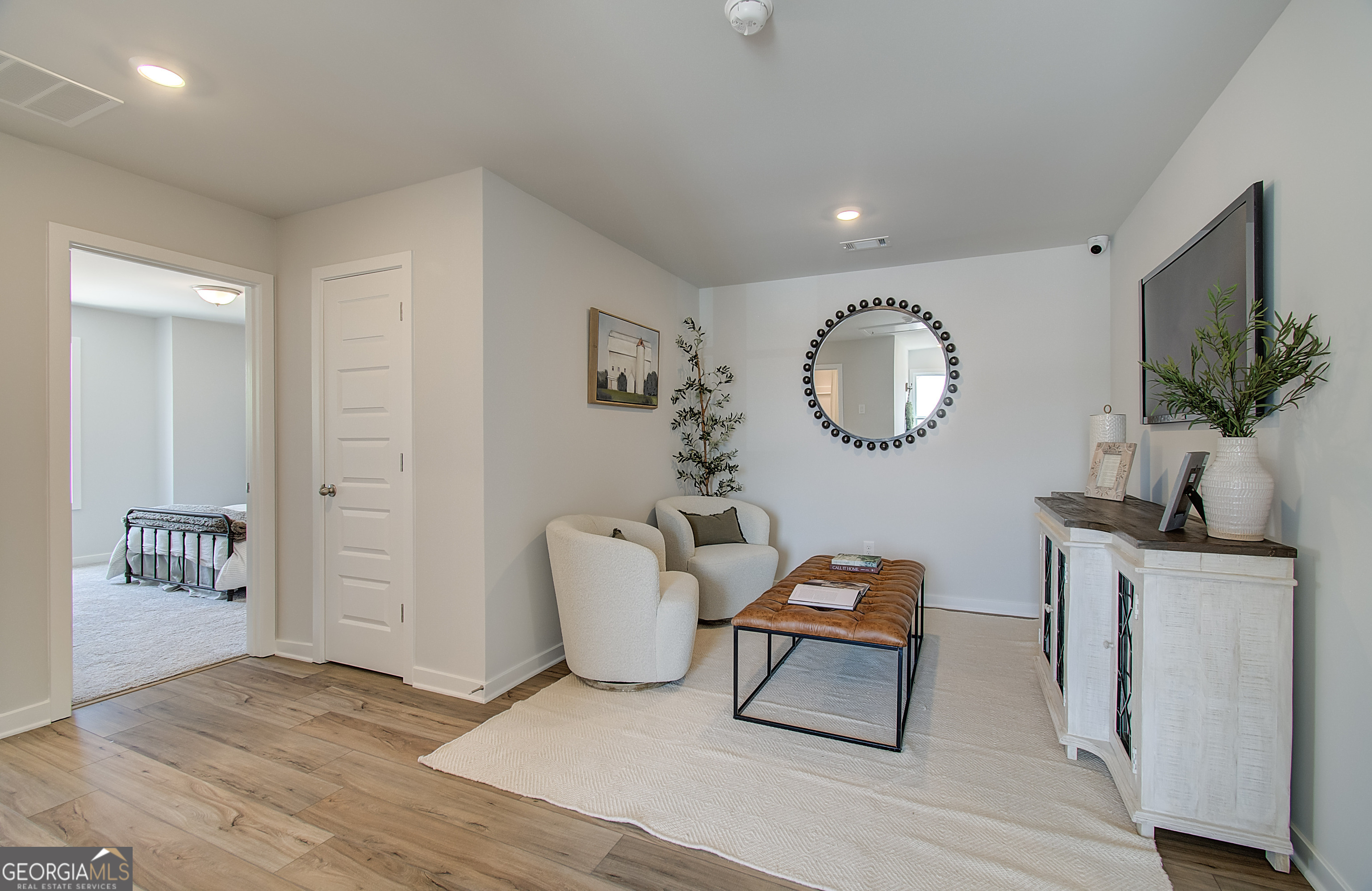 182 Depot Landing Road, Unit 65A Auburn, GA 30011 - Photo 16 of 37 a view of a hallway with seating area