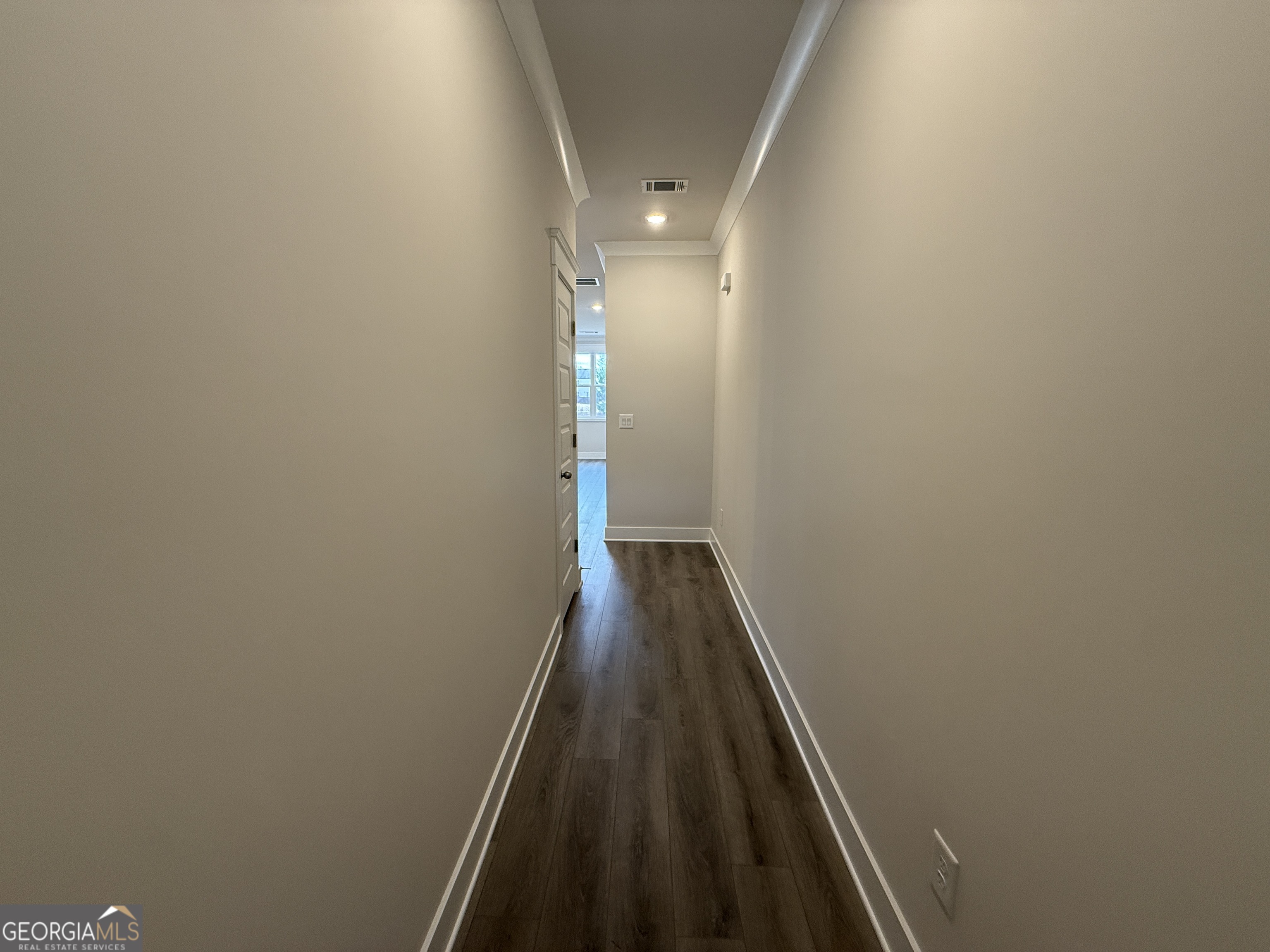 182 Depot Landing Road, Unit 65A Auburn, GA 30011 - Photo 2 of 36 a view of a hallway with wooden floor