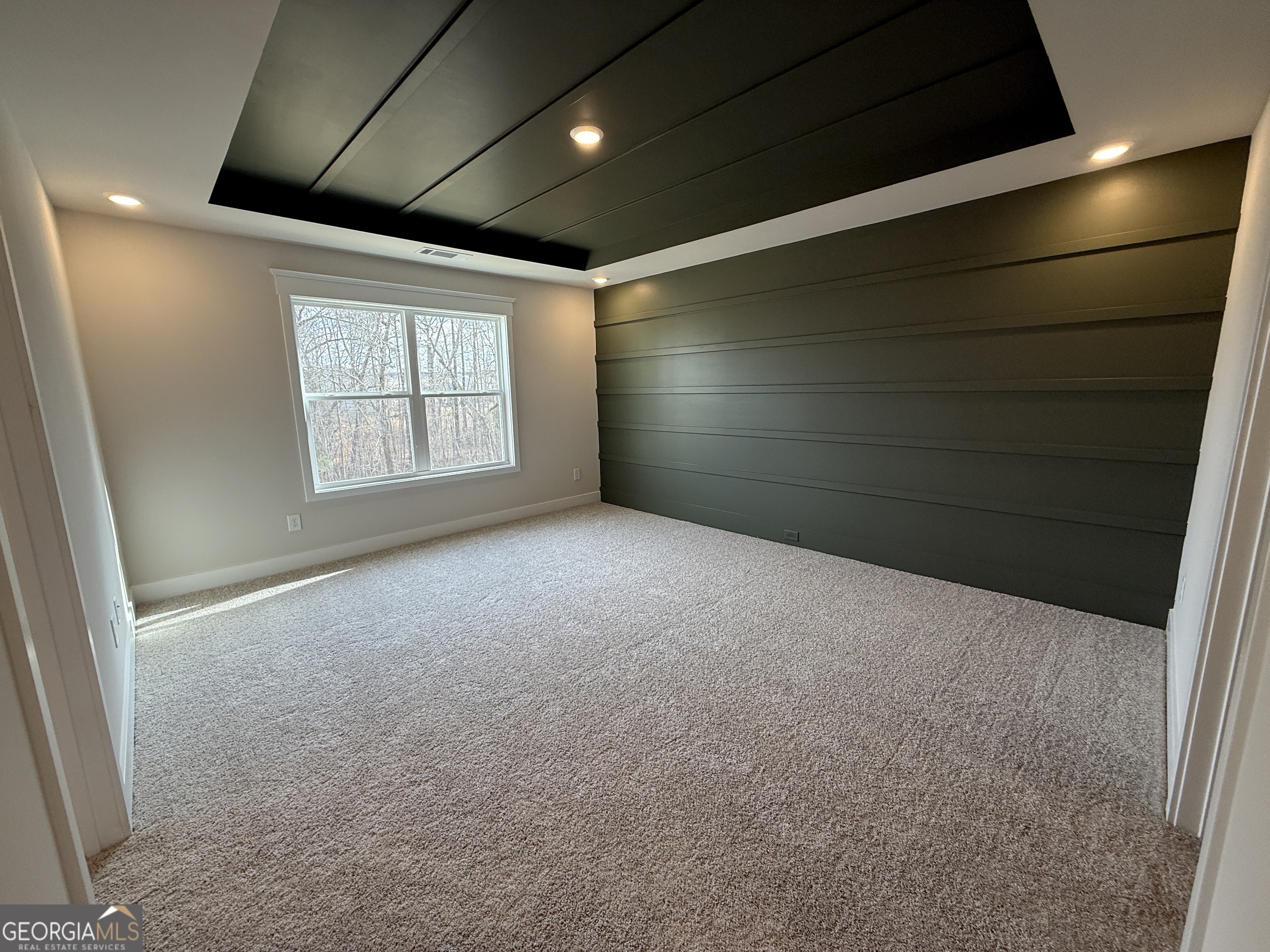 182 Depot Landing Road, Unit 65A Auburn, GA 30011 - Photo 21 of 36 a view of an empty room with a window