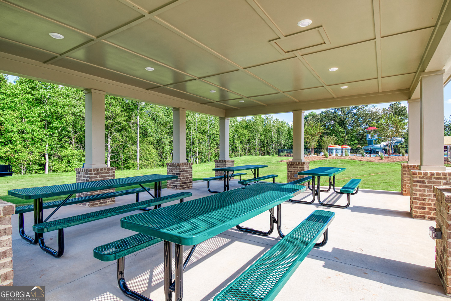 182 Depot Landing Road, Unit 65A Auburn, GA 30011 - Photo 33 of 37 a building outdoor space with patio furniture and garden