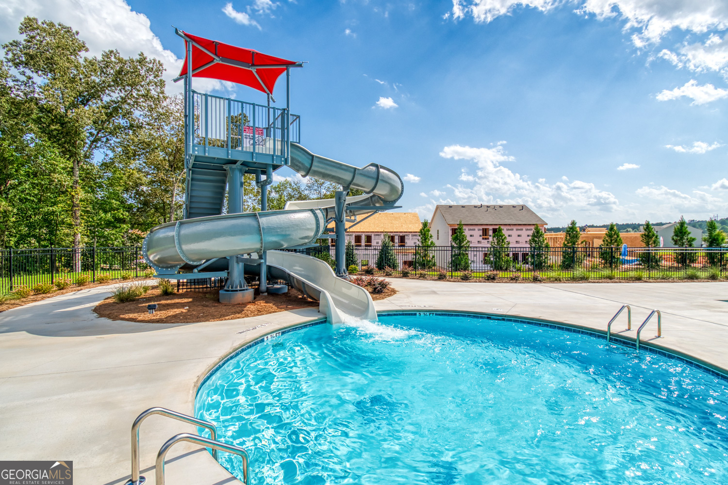 182 Depot Landing Road, Unit 65A Auburn, GA 30011 - Photo 35 of 37 a view of a swimming pool with sitting area