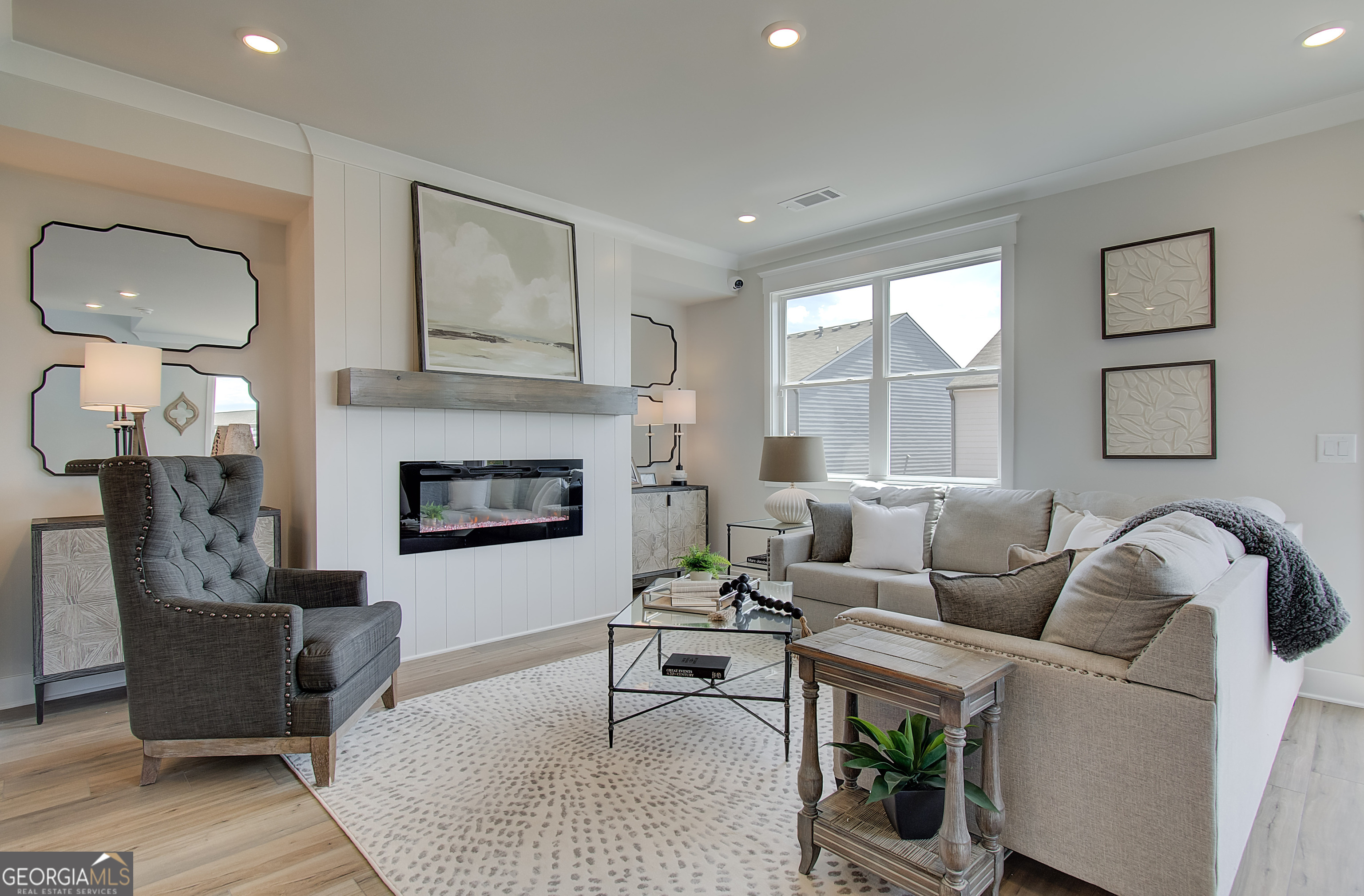 182 Depot Landing Road, Unit 65A Auburn, GA 30011 - Photo 5 of 37 a living room with furniture and a fireplace