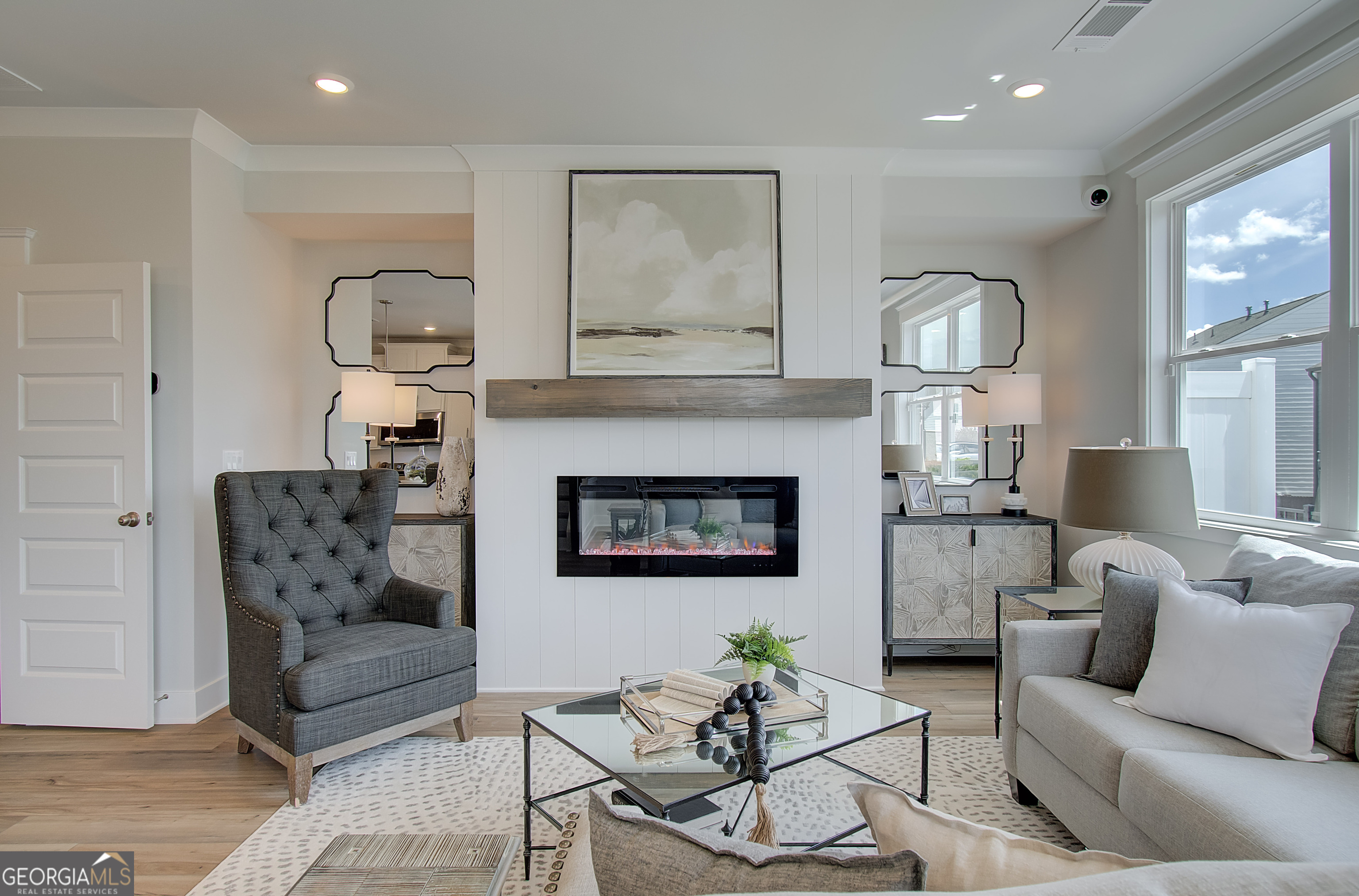 182 Depot Landing Road, Unit 65A Auburn, GA 30011 - Photo 6 of 37 a living room with furniture and a fireplace