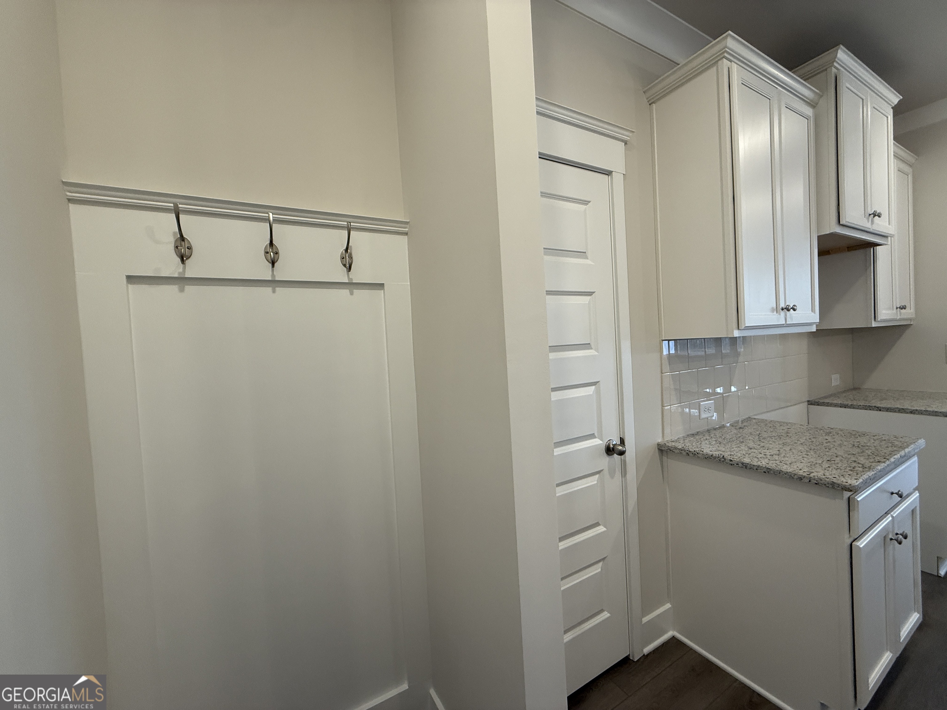 182 Depot Landing Road, Unit 65A Auburn, GA 30011 - Photo 7 of 36 a bathroom with a granite countertop sink and white cabinets