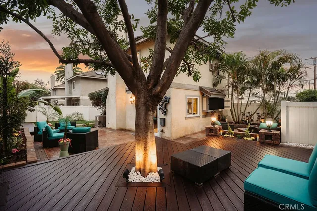 a view of a dinning room with wooden floor and outdoor seating