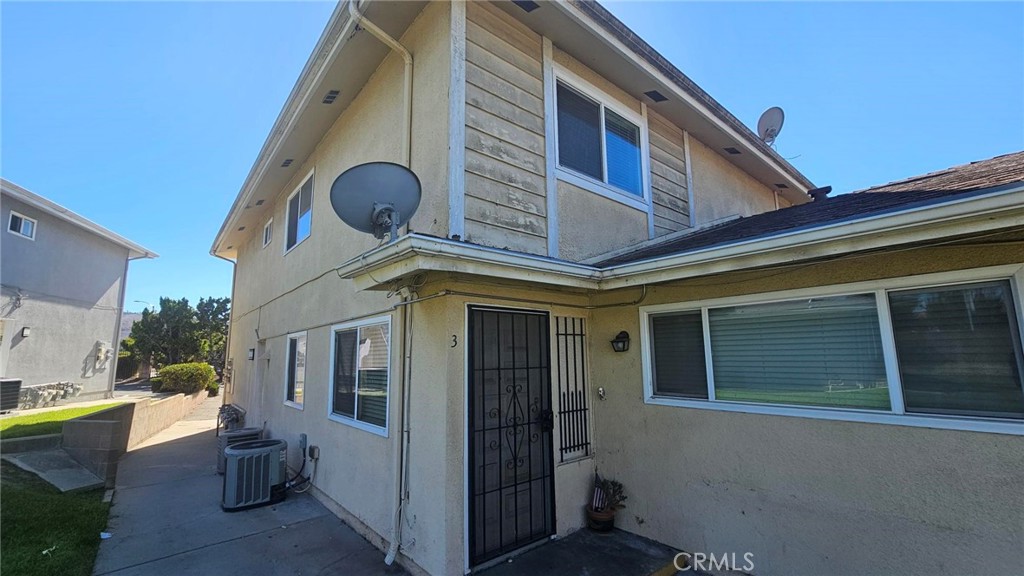 18206 Vía Dicha, Unit 3 Rowland Heights, CA 91748 - Photo 1 of 11 a view of a house with a large window and more windows