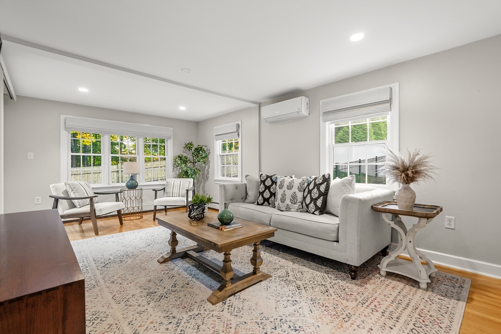 15 Bayberry Road Hingham, MA 02043 - Photo 11 of 24 a living room with furniture and a large window