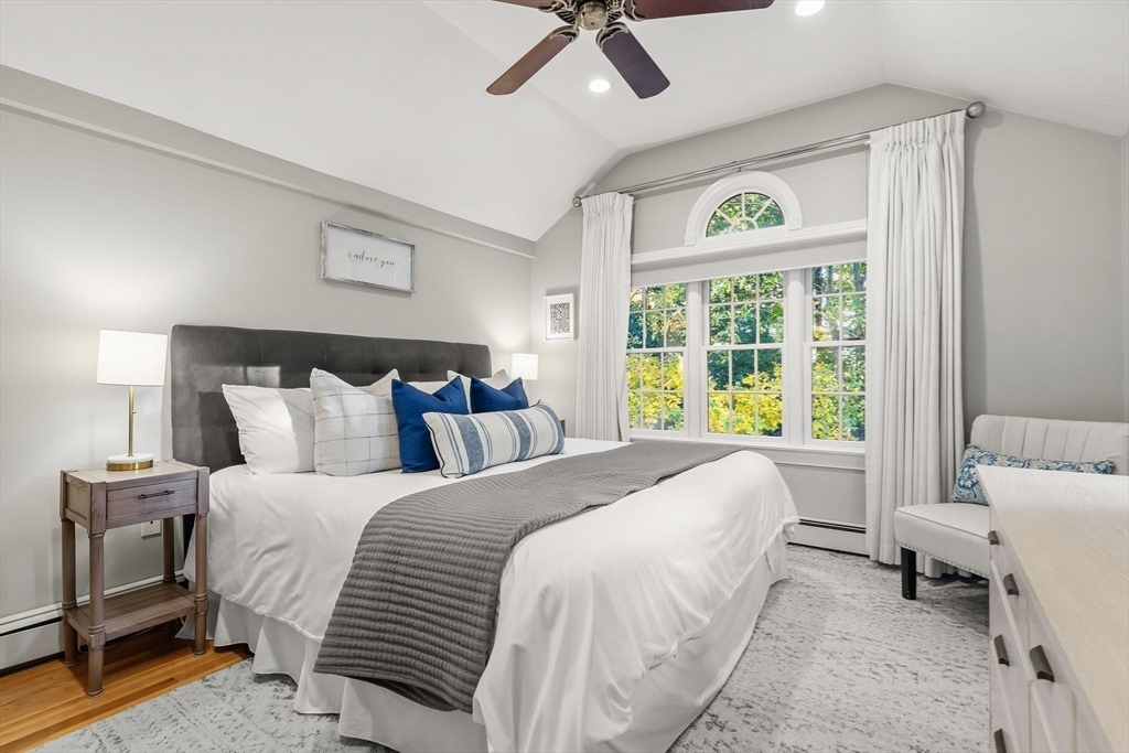 15 Bayberry Road Hingham, MA 02043 - Photo 15 of 24 a bed room with a bed and a chair