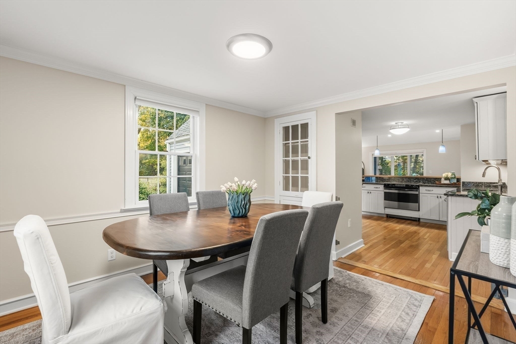 15 Bayberry Road Hingham, MA 02043 - Photo 9 of 24 a view of a dining room with furniture and a potted plant