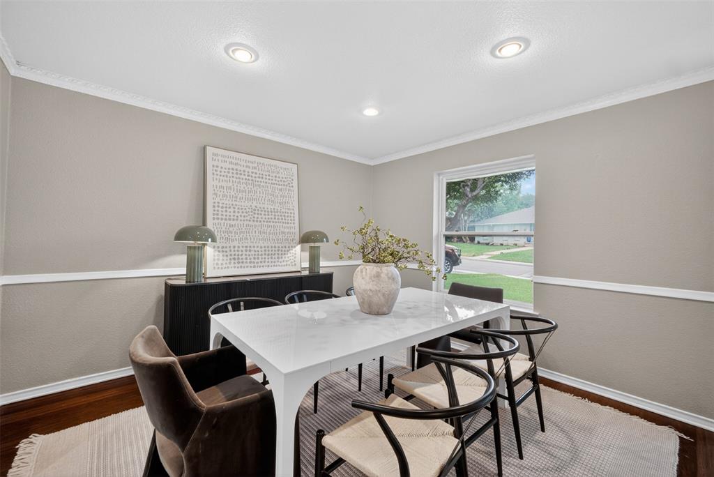 9660 Timberleaf Drive Dallas, TX 75243 - Photo 16 of 40 Dining space featuring neutral paint, crown molding, chair rail, recessed lighting, and wood-finish flooring