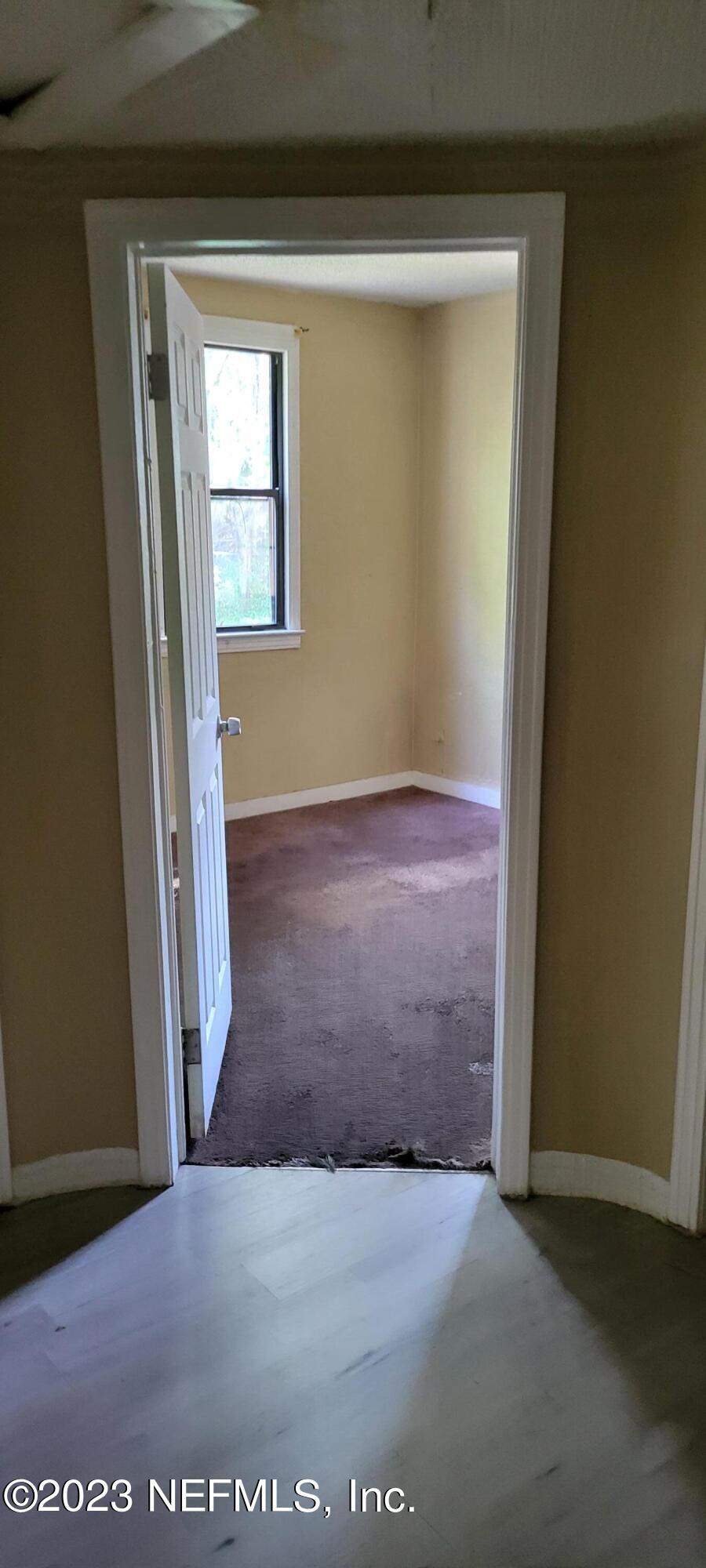 4069 Walnut Street Jacksonville, FL 32206 - Photo 13 of 14 a view of an front door