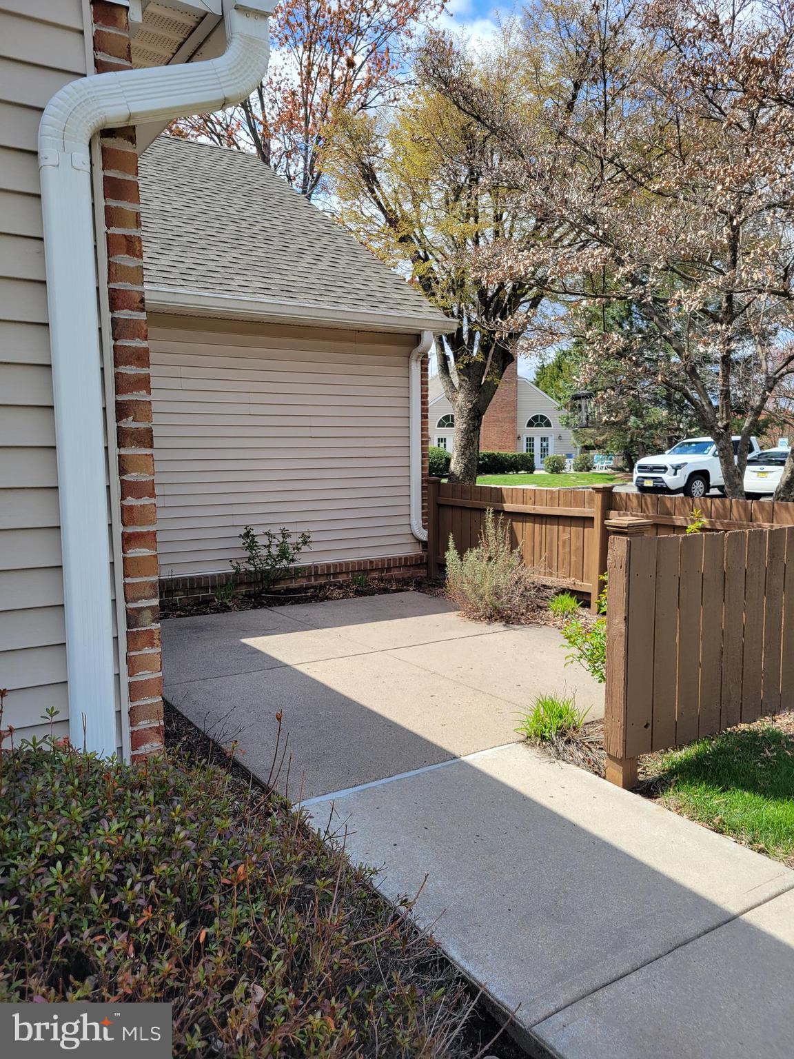 43 Woolsey Court Pennington, NJ 08534 - Photo 2 of 5 a view of a backyard with a tree