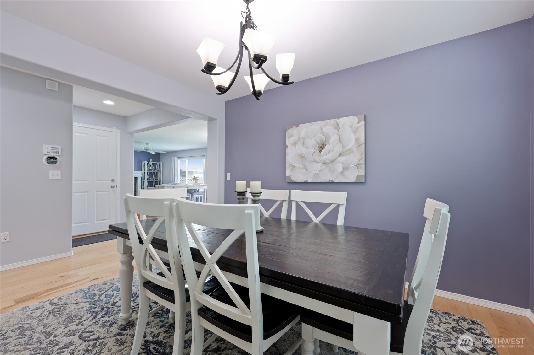 6914 Axis Street Southeast Lacey, WA 98513 - Photo 11 of 38 a view of a dining room with furniture and wooden floor