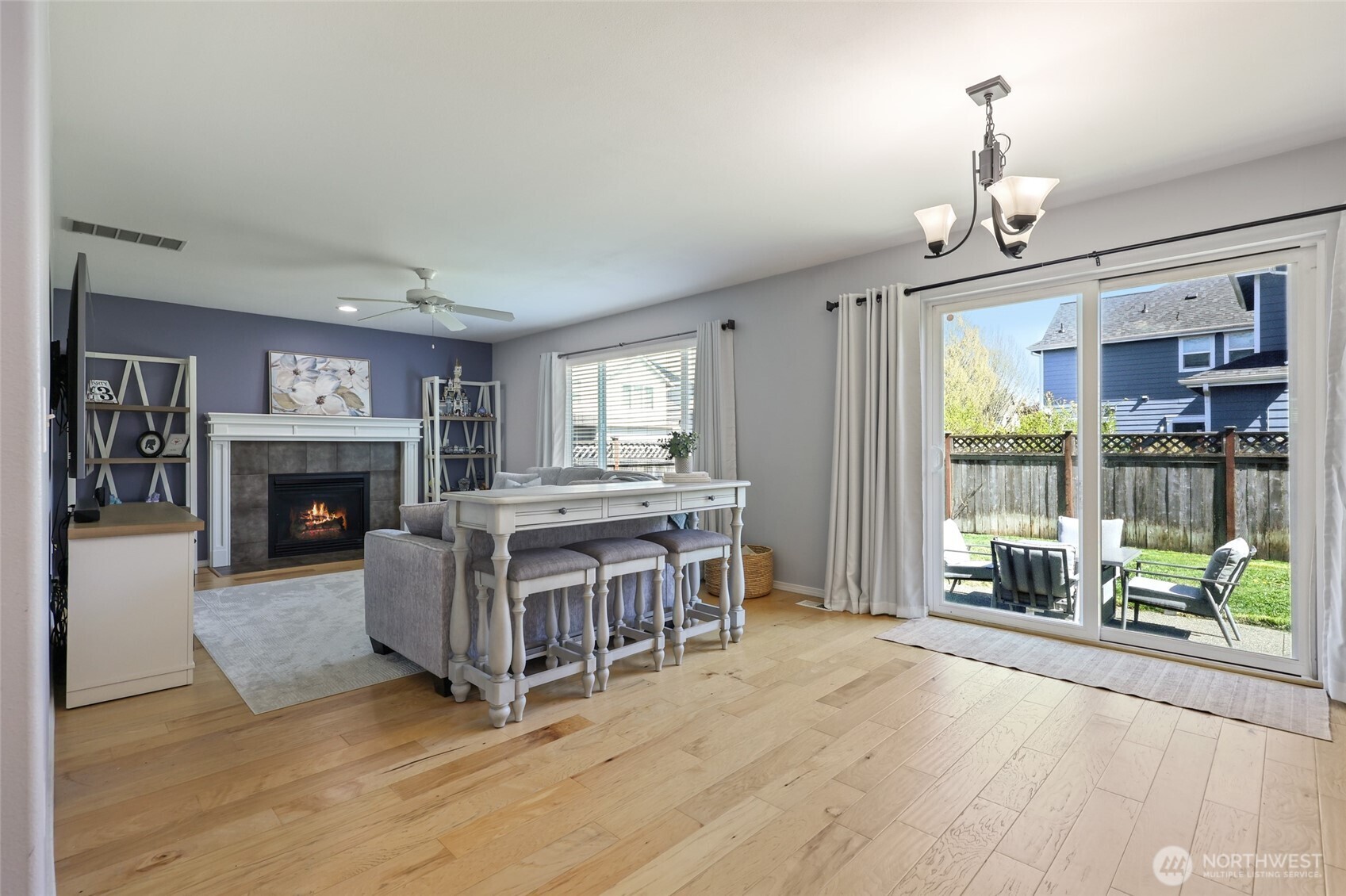 6914 Axis Street Southeast Lacey, WA 98513 - Photo 15 of 38 a living room with furniture and a fireplace